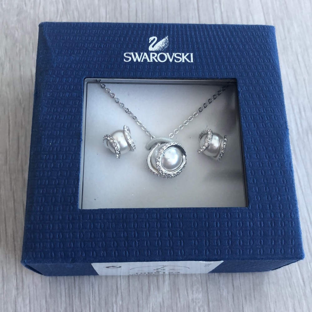 Brand new Swarovski necklace and earrings set